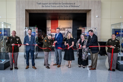 (Left to Right) Jay Fox, Hensel Phelps Construction; Maj. Gen. Thomas H. Mancino, adjutant general for Oklahoma, Mayor David Holt, mayor of Oklahoma City, Mrs. Cindy Lankford, representing Senator James Lankford; Dr. Denise Neil, Oklahoma National Guard Museum executive director, join in the ribbon cutting for the Oklahoma National Guard Museum in Oklahoma City, June 11, 2026. (Oklahoma National Guard photo by Anthony Jones)