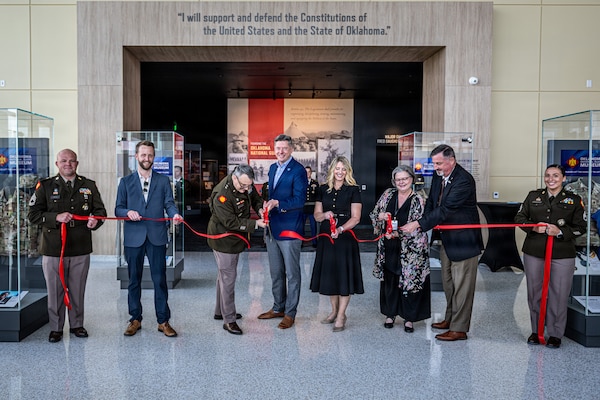 (Left to Right) Jay Fox, Hensel Phelps Construction; Maj. Gen. Thomas H. Mancino, adjutant general for Oklahoma, Mayor David Holt, mayor of Oklahoma City, Mrs. Cindy Lankford, representing Senator James Lankford; Dr. Denise Neil, Oklahoma National Guard Museum executive director, join in the ribbon cutting for the Oklahoma National Guard Museum in Oklahoma City, June 11, 2026. (Oklahoma National Guard photo by Anthony Jones)