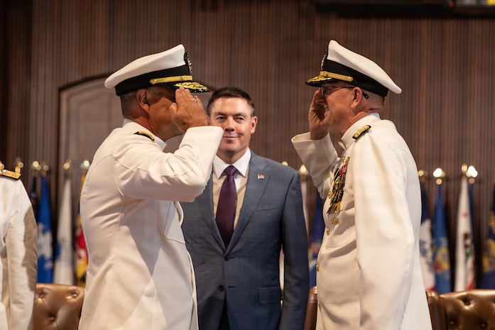 Vice Adm. Douglas L. Williams (left) relieves Vice Adm. Johnny Wolfe Jr. (right) as the Director for Portfolio Acquisition Executive (PAE) Strategic Systems Programs (SSP) in Washington D.C., on June 12, 2026. Williams assumes command of PAE SSP as the 15th director in program history. Wolfe, who led PAE SSP for more than eight years, is retiring from the Navy after devoting more than 38 years to active-duty service. The Honorable William Mahan (center), performing the duties of the Assistant Secretary of the Navy for Research, Development, and Acquisition, served as the presiding officer at the PAE SSP Change of Command ceremony. (U.S. Navy photo by Adrian Pacheco)
