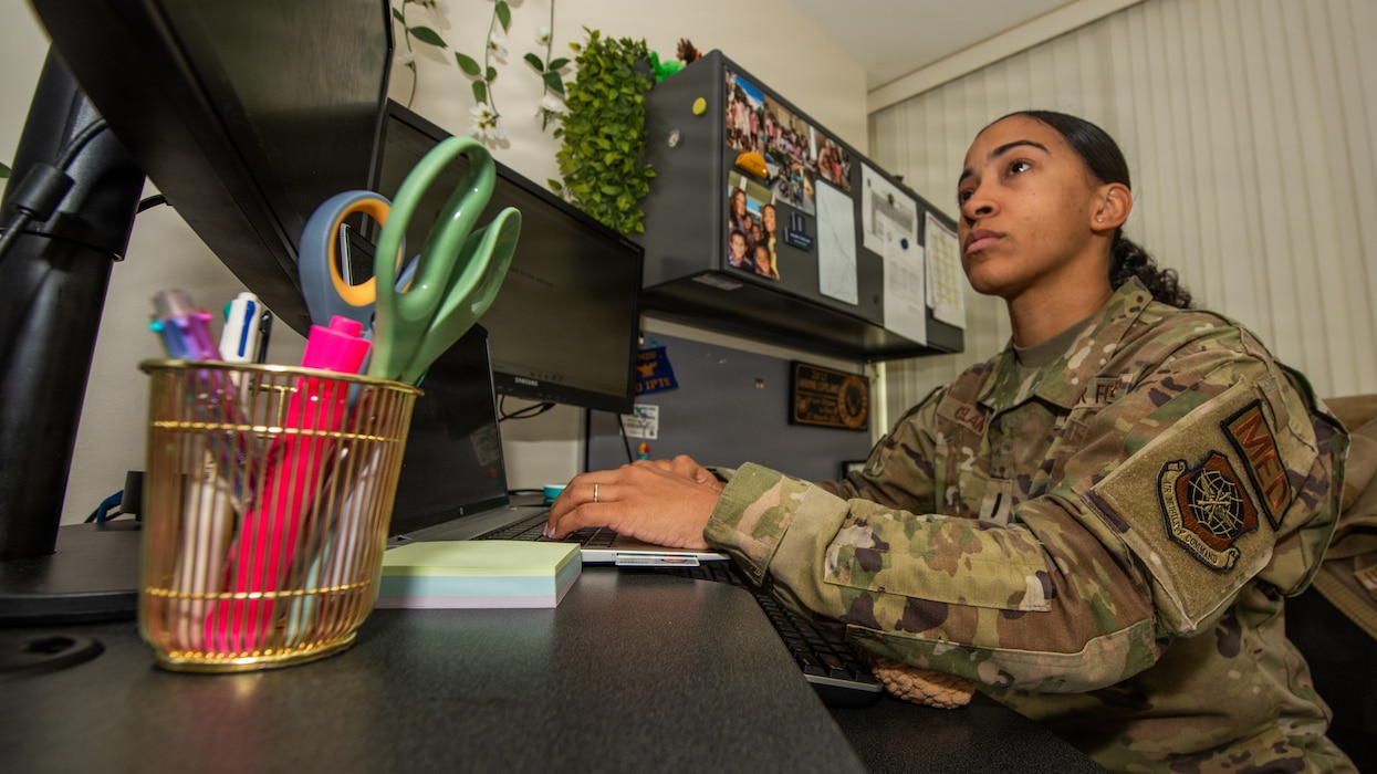 Airman working at desk