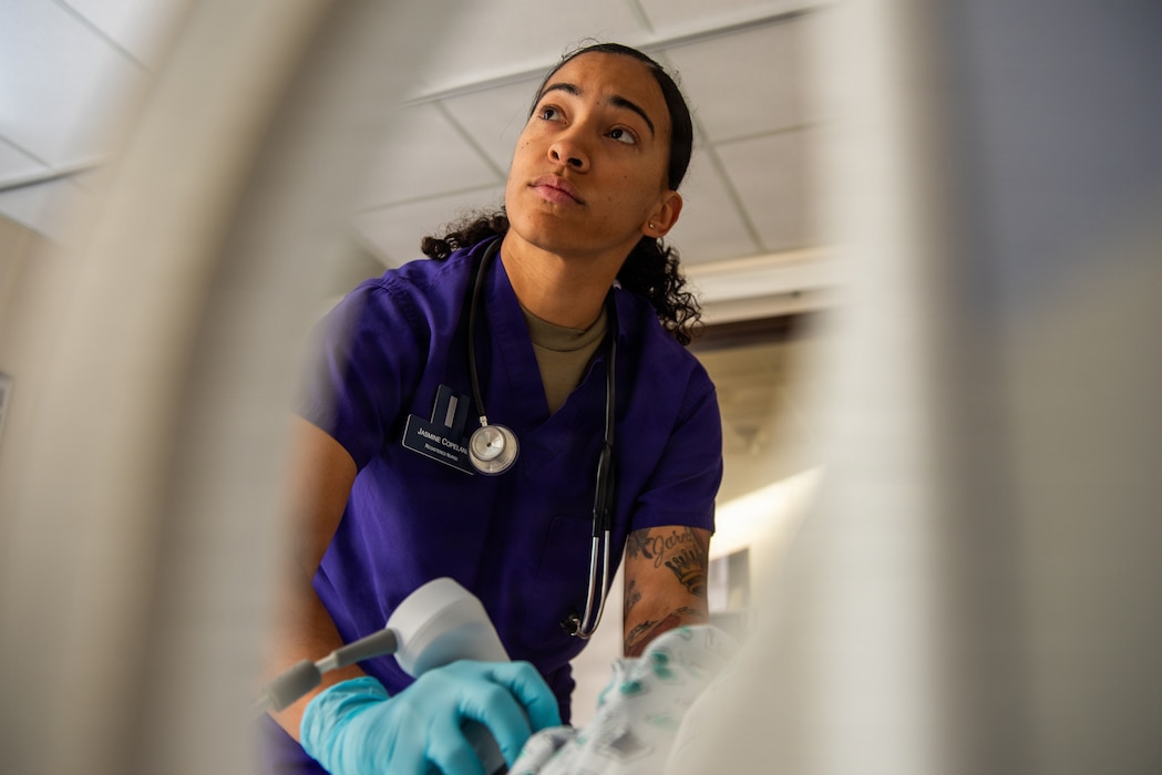 Airman performs patient care