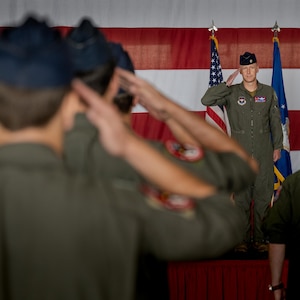 U.S. Air Force Lt. Col. James Hesson, 87th Flying Training Squadron incoming commander, renders a first salute to his squadron during the 87th FTS change of command ceremony at Laughlin Air Force Base, Texas, June 12, 2026. Change of command ceremonies represent a formal transfer of authority and responsibility for a unit from one commanding officer to another. (U.S. Air Force photo by Airman 1st Class Harrison Sullivan)