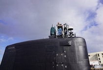 Chad Renti Cruz, Pearl Harbor Naval Shipyard and Intermediate Maintenance Facility (PHNSY & IMF) project superintendent for USS Colorado (SSN 788) stands atop the Virginia-class fast-attack submarine during its return from sea trials during a maintenance period at Joint Base Pearl Harbor-Hickam, June 6, 2026.