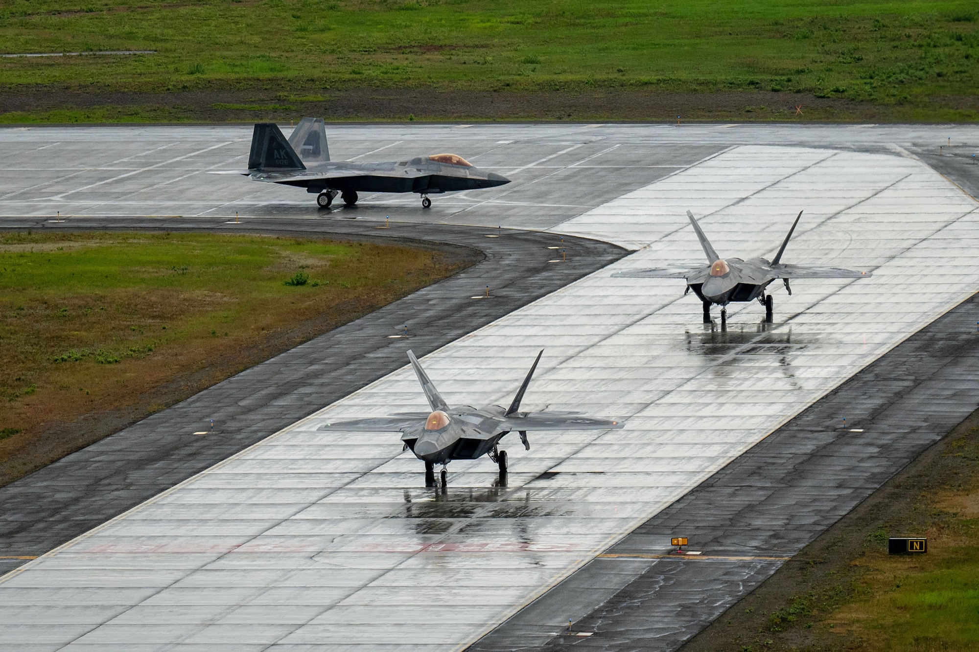 F-22 Raptor aircraft taxi for takeoff at Joint Base Elmendorf-Richardson, Alaska, June 8, 2026.
