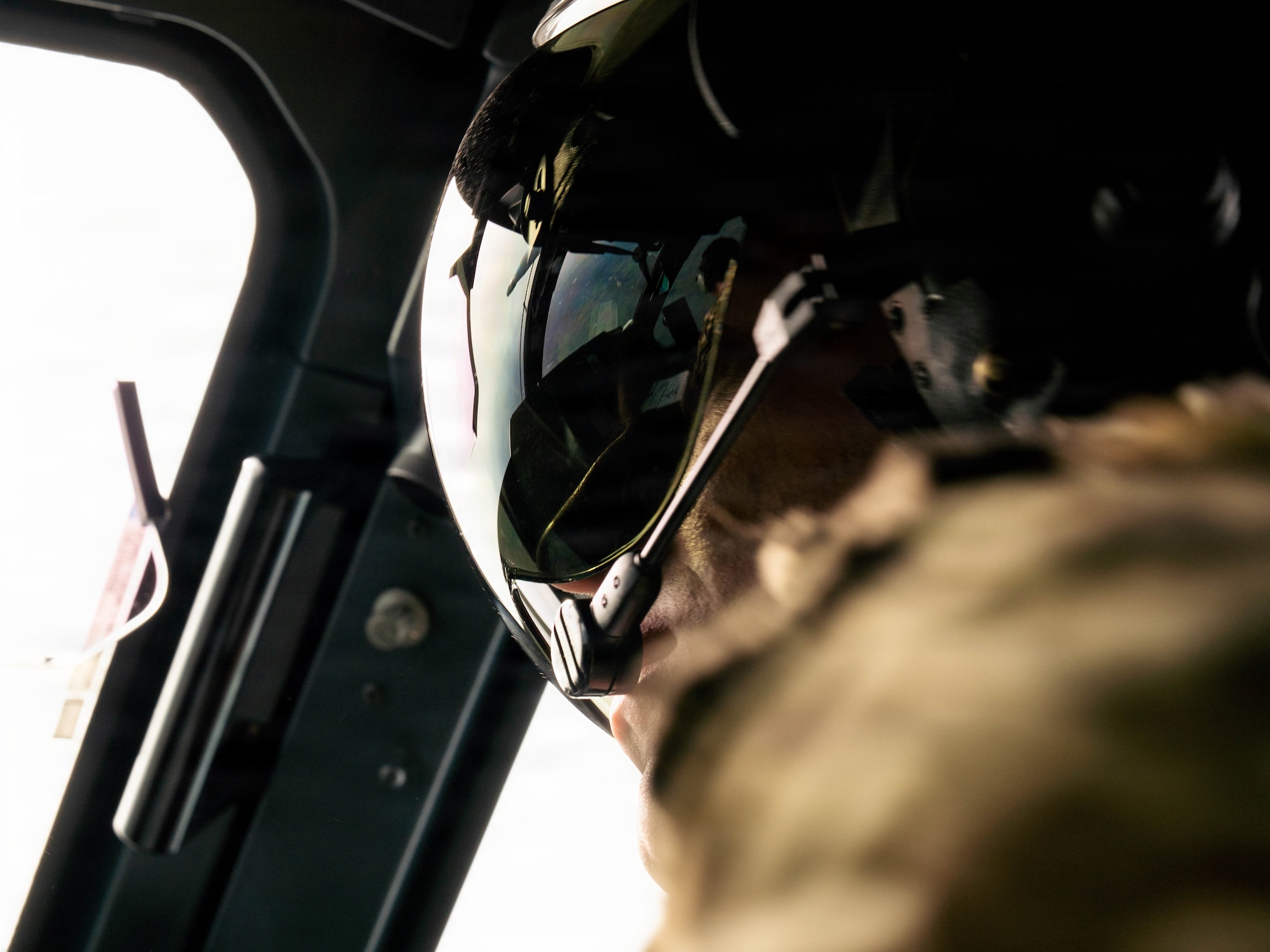 A Royal Air Force service member operates an Airbus A400M Atlas aircraft assigned to No. 70 Squadron during a cargo drop in support of RED FLAG-Alaska 26-2, June 10, 2026. The event combined joint and coalition forces into a realistic combat scenario designed to enhance readiness, lethality and integrated operations. (U.S. Air Force photo by Airman 1st Class Keola Vischi)