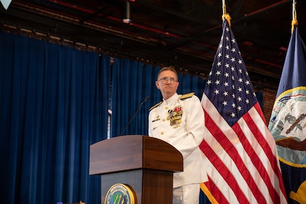 Vice Adm. Johnny Wolfe Jr., the outgoing director of Portfolio Acquisition Executive (PAE) Strategic Systems Programs (SSP), speaks to guests and the PAE SSP workforce at the PAE SSP Change of Command ceremony in Washington D.C., on June 12, 2026. The event highlighted the transfer of leadership from Vice Adm. Johnny Wolfe Jr., to Vice Adm. Douglas L. Williams. Williams assumes command of PAE SSP as the 15th director in program history. (U.S. Navy photo by Adrian Pacheco)