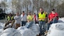 In addition to Downing (second from right), multiple staff from other USACE districts across the country are contributing on-ground to the Mendenhall effort. Construction oversight, flood response engineering and emergency management are each supported by USACE employees from outside Alaska.