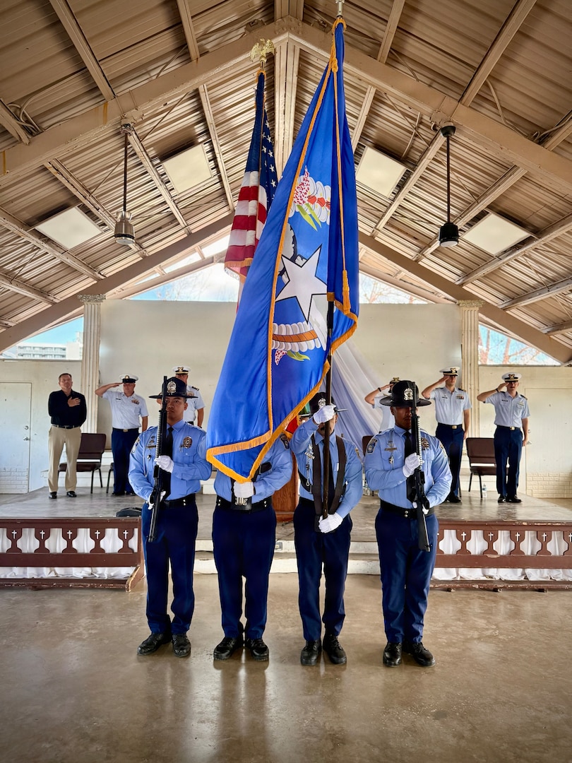 Partners from the Commonwealth of the Northern Mariana Department of Public Safety present the colors as Capt. Jesica Worst, Lt. Justin Miller, and Lt. Gabriel LaMartina salute at a change of command ceremony for Marine Safety Unit Saipan in Saipan on June 13, 2026. During Miller's tenure from October 2023 to June 2026, MSU Saipan stood up as a full Marine Safety Unit — elevated from Marine Safety Detachment Saipan on April 5, 2024 — and matured into the Coast Guard's permanent prevention and response presence across the Commonwealth. Under his leadership, the unit advanced maritime safety, security, and environmental stewardship through vessel inspections, port state control examinations, container inspections, and continuous engagement with port partners and local leaders. (U.S. Coast Guard photo by Dee Cruz)
