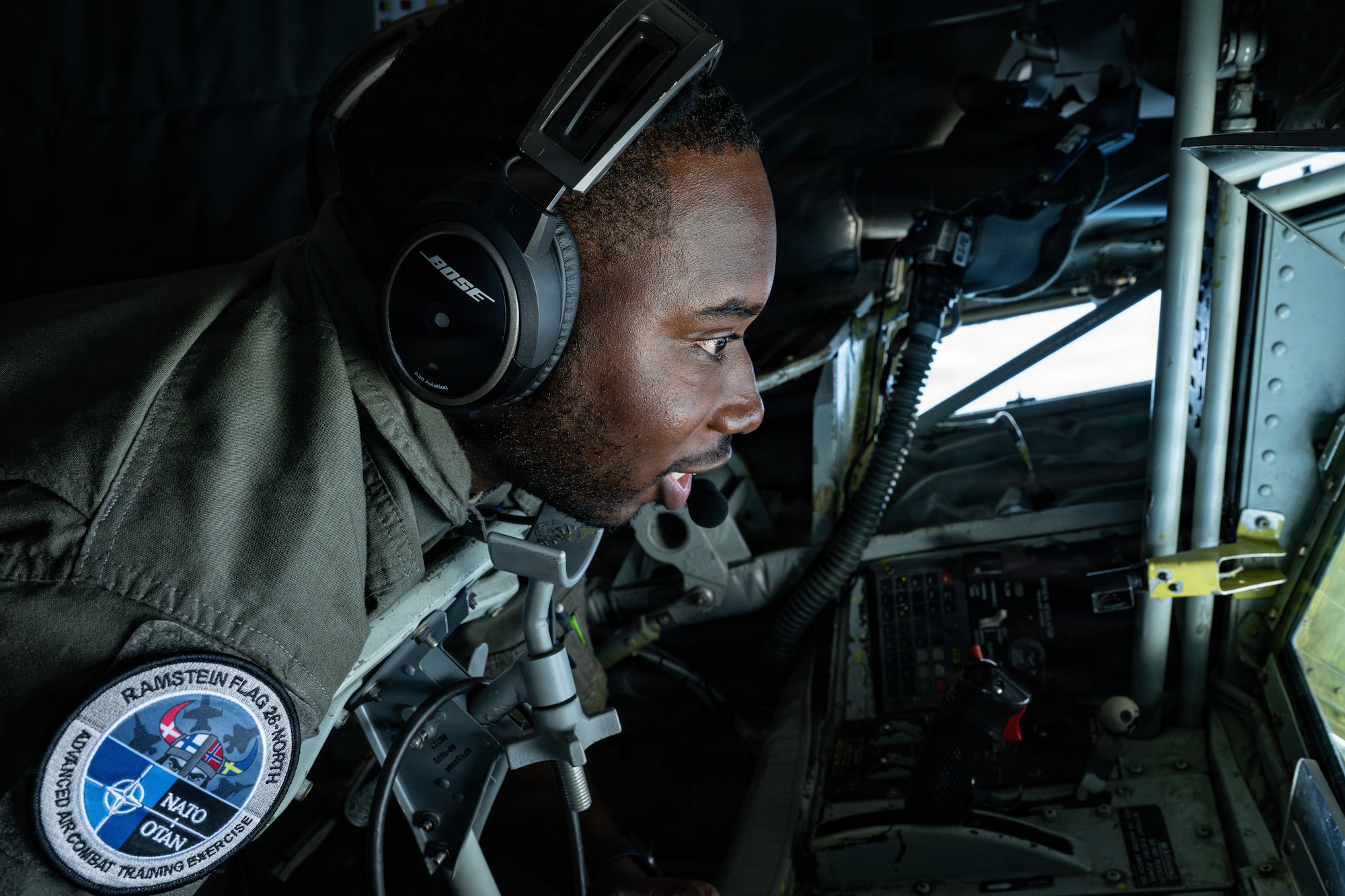U.S. Air Force Staff Sgt. Mendè Lahens, 351st Air Refueling Squadron boom operator, performs refueling operations in the boom pod of a 100th Air Refueling Wing KC-135 Stratotanker during Ramstein Flag 26 over Brekstad, Norway, June 8, 2026.
