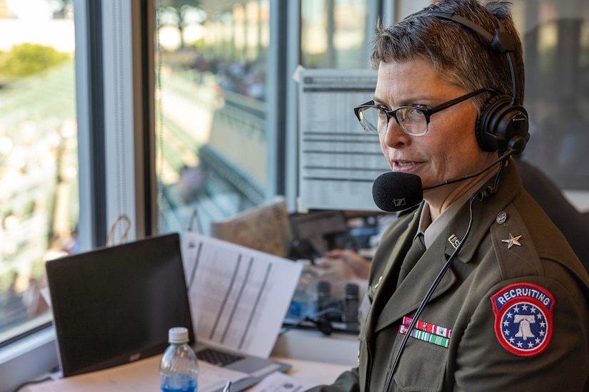 Brig. Gen. Sara Dudley, U.S. Army Recruiting Division commanding general, talks with Indianapolis Indians announcer Howard Kellman during an Indianapolis Indians baseball game at Victory Field in Indianapolis June 12, 2026. The Indians paid special tribute to the 251st birthdays of both the U.S. Army and Army Finance Corps. (U.S. Army photo by Mark R. W. Orders-Woempner)