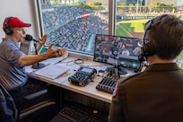 Brig. Gen. Sara Dudley, U.S. Army Recruiting Division commanding general, talks with Indianapolis Indians announcer Howard Kellman during an Indianapolis Indians baseball game at Victory Field in Indianapolis June 12, 2026. The Indians paid special tribute to the 251st birthdays of both the U.S. Army and Army Finance Corps. (U.S. Army photo by Mark R. W. Orders-Woempner)