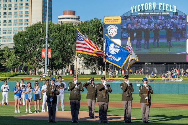 A color guard made up of recruiters from the U.S. Army Indianapolis Recruiting Battalion presents the Colors before an Indianapolis Indians baseball game at Victory Field in Indianapolis June 12, 2026. The Indians paid special tribute to the 251st birthdays of both the U.S. Army and Army Finance Corps. (U.S. Army photo by Mark R. W. Orders-Woempner)