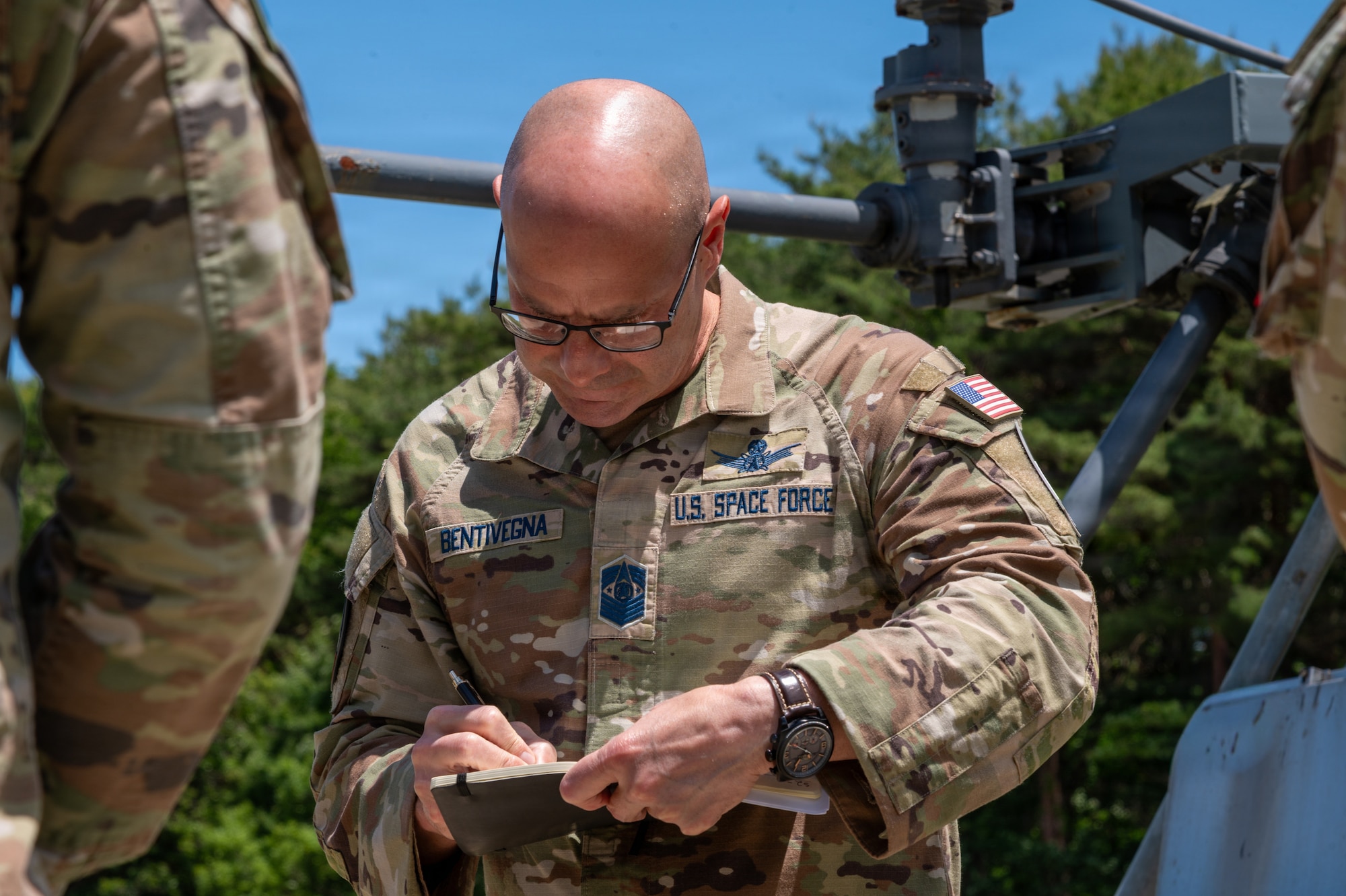 Chief Master Sgt. of the Space Force John Bentivegna takes notes during his visit to the 5th Space Warning Squadron Detachment 4 at Misawa Air Base, Japan, June 10, 2026.