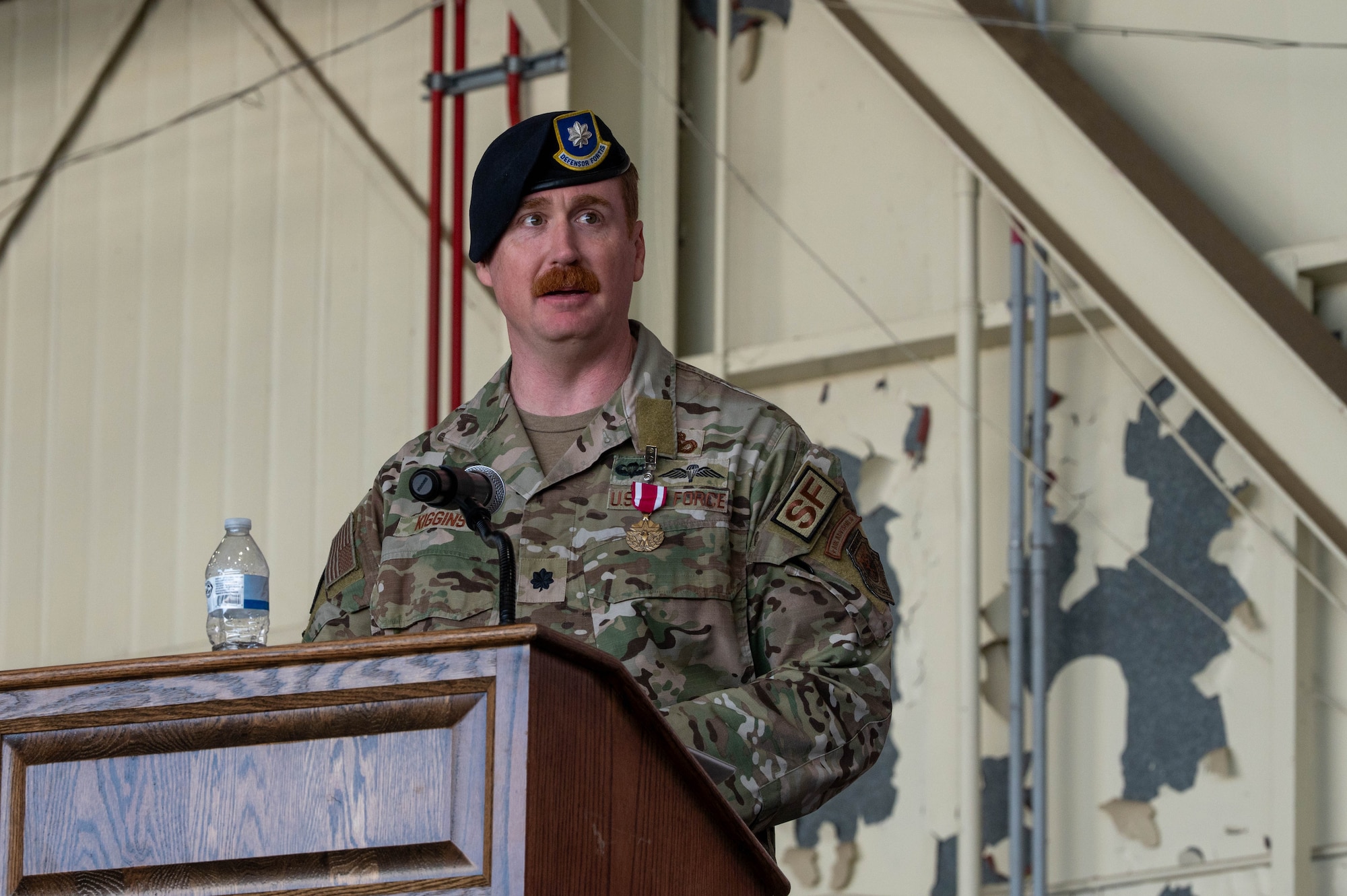U.S. Air Force Lt. Col. Ryan Kiggings, 8th Security Forces Squadron outgoing commander, gives his remarks during the 8th SFS change of command ceremony at Kunsan Air Base, Republic of Korea, June 12, 2026. Change of command ceremonies represent the formal transfer of authority and responsibility for a squadron, group or wing from one commanding officer to another. (U.S. Air Force photo by Staff Sgt. Cedrique Oldaker)