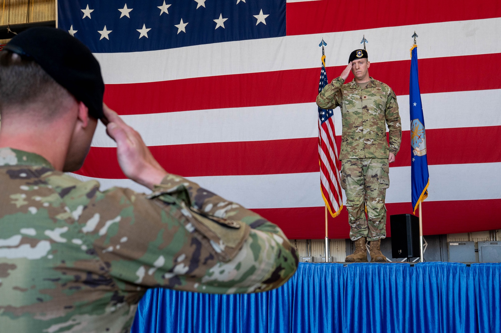 U.S. Air Force Maj. Adam Palmer, 8th Security Forces Squadron incoming commander, gives his first salute to the squadron during the 8th SFS change of command ceremony at Kunsan Air Base, Republic of Korea, June 12, 2026. The first salute represents the official transfer of authority, mutual respect, and the assumption of the ultimate responsibility to lead the unit. (U.S. Air Force photo by Staff Sgt. Cedrique Oldaker)