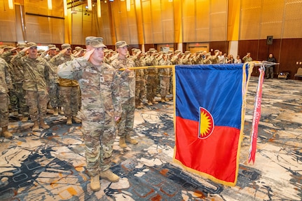 Capt. Nathan Scull, formation commander, salutes as the 234th Army Band, Oregon Army National Guard, plays the national anthem during an official demobilization ceremony at the Salem Convention Center in Salem, Ore., June 14, 2026.