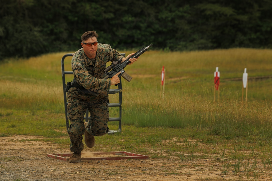 U.S. Marine Corps Cpl. Joseph Rogers, a competitor with the USMC Shooting Team, competes in the “Action Rifle” match of the 65th annual Interservice Rifle Competition at Weapons Training Battalion on Marine Corps Base Quantico, June 8, 2026. The ISRC consists of multiple  disciplines of rifle competition including a High-Power 1,000 Aggregate match, a High-Power Long-Range match, a Quantified Performance, Gas Gun match and a Practical Competition  Shooting League Action Carbine match. (U.S. Marine Corps photo by Cpl. Harleigh Faulk)