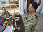(260610-N-QW460-1002) BREMERTON, Wash. (June 10, 2026) – Hospitalman Karsyn Dalpiaz, assigned to Naval Hospital Bremerton, discusses prostate cancer screening guidelines and preventive health measures with Hospital Corpsman 2nd Class Janard Cole during a men’s health promotion event on the command quarterdeck, June 10, 2026. The event, hosted by the NHB Health Promotion and Wellness Center, focused on encouraging early detection, routine screenings, and proactive healthcare choices to maintain operational readiness across the command. (U.S. Navy photo by Mass Communication Specialist 1st Class Jennifer Benedict, NHB/NMRTC Bremerton Public Affairs).