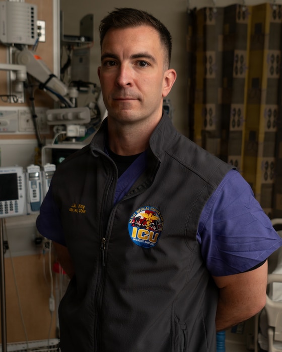 U.S. Navy Lt. Justin King, Trauma Nursing Core Course program director assigned to 1st Medical Battalion, poses for a photo ahead of the launch of the pilot virtual TNCC program, at Naval Medical Center San Diego, May 27. The three-day pilot course, conducted June 10-12, was facilitated through NMCSD’s Staff Education and Training Department. The mission of NMCSD is to optimize health and enhance readiness. NMCSD employs more than 5,500 active-duty military personnel, civilians, and contractors in southern California to deliver exceptional care afloat and ashore. (U.S. Navy photo by Mark Campbell)