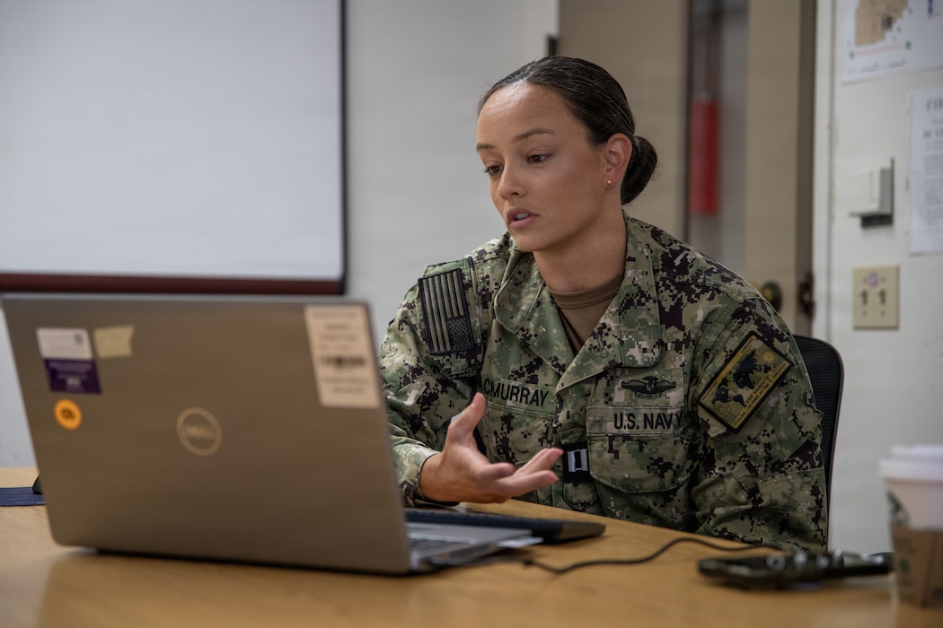 U.S. Navy Lt. Krista MacMurray, Trauma Nursing Core Course program director assigned to Navy Medicine Readiness and Training Command San Diego, interacts with students online during the launch of the pilot virtual TNCC program at Naval Medical Center San Diego, June 10. The program reinforces NMCSD’s role as one of the Navy’s premier military treatment facilities and a leader in developing innovative solutions that strengthen operational medicine and support warfighter readiness. NMRTC San Diego supports Navy and Marine Corps readiness by ensuring its medical forces are ready to deploy and provide medical support, ashore or at sea. (U.S. Navy photo by Mass Communication Specialist 3rd Class Jason Afable)