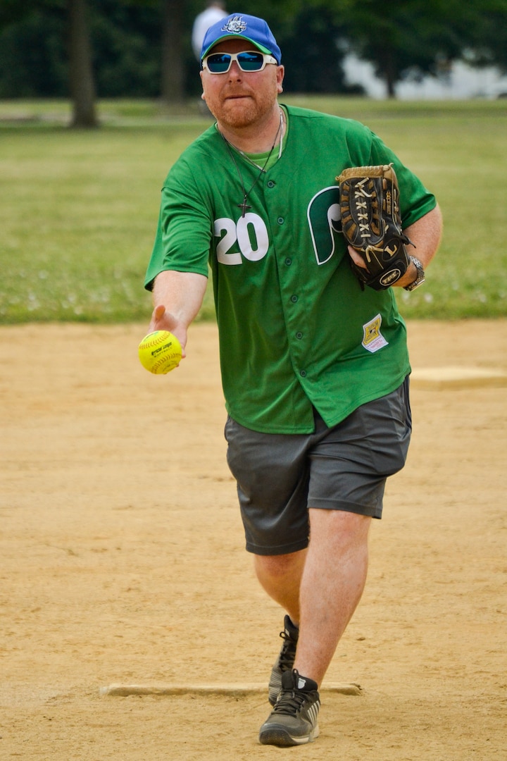Pitcher throws ball.