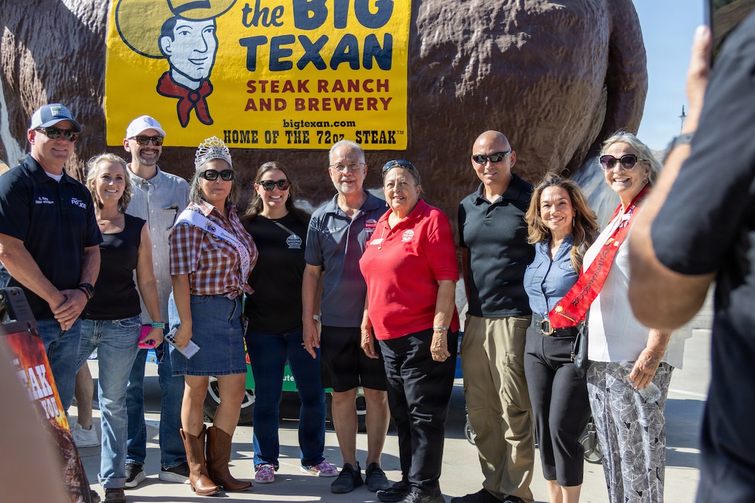 Colonel Russell Savatt, base commanding officer, and the Marine Corps Logistics Base Barstow Walking Color Guard joined the Route 66 Mother Road Museum along with The Big Texan for the Route 66 Centennial Caravan in Barstow, California, June 7. The event included a 72-ounce steak eating contest, alongside notable representation from the City of Barstow, as well as various vendors who came together to commemorate the 100th anniversary of Route 66 and the historical significance it has contributed to the city.