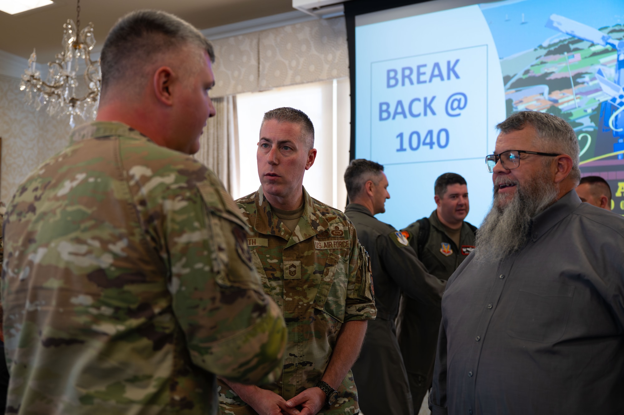 U.S. Air Force and CLACON attendees talk among each other during the Cryptologic Language Analyst Convention at Defense Language Institute, Presidio of Monterey, Calif., May 13, 2026.