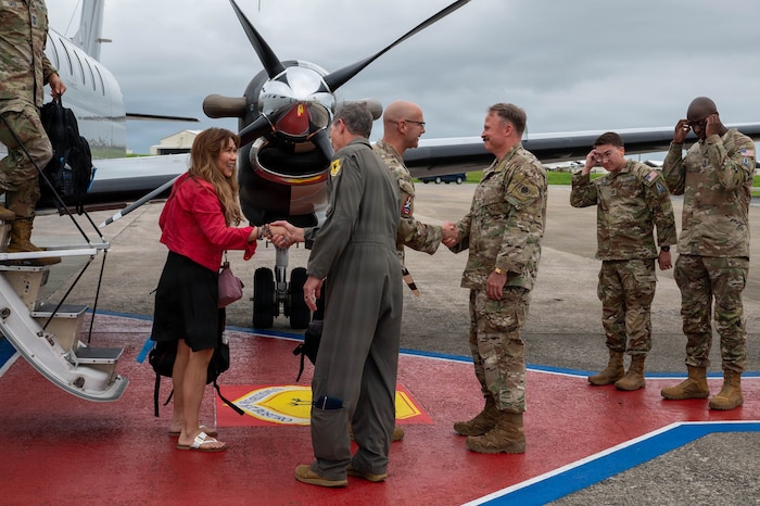 Chief Master Sergeant of the Space Force John Bentivegna and his spouse Cathy Bentivegna are welcomed by Brig. Gen. John Gallemore and Chief Master Sgt. Will Cupp upon their arrival at Kadena Air Base, Japan, June 11, 2026. Bentivegna visited Kadena to engage with Guardians, Airmen, and senior leaders, gaining insight into the installation’s role in supporting joint force operations and maintaining readiness  throughout the Indo-Pacific region. (U.S. Air Force photo by Airman 1st Class Nathaniel Jackson)