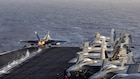An F/A-18E Super Hornet, attached to Strike Fighter Squadron (VFA) 14, launches from the flight deck of Nimitz-class aircraft carrier USS Abraham Lincoln (CVN 72), June 10, 2026. Abraham Lincoln is deployed to the U.S. 5th Fleet area of operations to support maritime security and stability in the Middle East. (U.S. Navy photo)