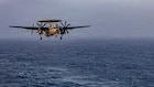 An E-2D Hawkeye, attached to Airborne Command & Control Squadron (VAW) 117, prepares to make an arrested landing on the flight deck of Nimitz-class aircraft carrier USS Abraham Lincoln (CVN 72), June 10, 2026. Abraham Lincoln is deployed to the U.S. 5th Fleet area of operations to support maritime security and stability in the Middle East. (U.S. Navy photo)