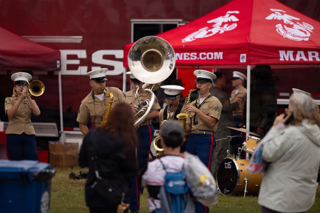 U.S. Marines with the 2nd Marine Aircraft Wing Band perform during the Coca Cola 600 at Charlotte Motor Speedway in Concord, North Carolina, May 23, 2026. The U.S. Marine Corps supported the Coca-Cola 600, a NASCAR race held during Memorial Day weekend, with static displays of military aircraft and vehicles and participation in ceremonies. (U.S. Marine Corps photo by Lance Cpl. Michael Robinson)