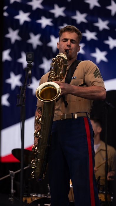 U.S. Marines with the 2nd Marine Aircraft Wing Band perform during the Coca Cola 600 at Charlotte Motor Speedway in Concord, North Carolina, May 23, 2026. The U.S. Marine Corps supported the Coca-Cola 600, a NASCAR race held during Memorial Day weekend, with static displays of military aircraft and vehicles and participation in ceremonies. (U.S. Marine Corps photo by Lance Cpl. Michael Robinson)