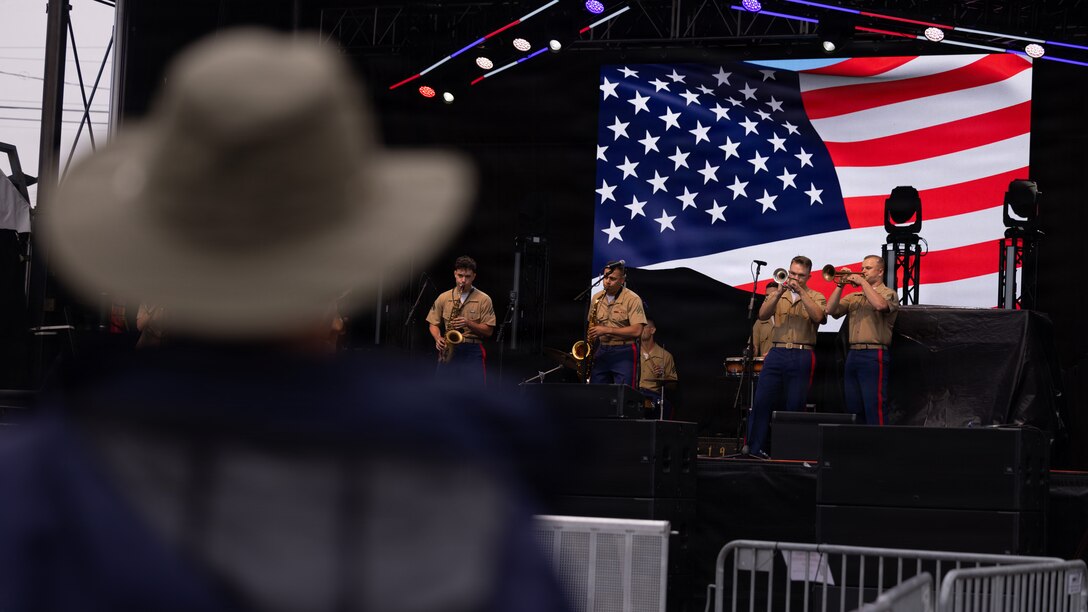 U.S. Marines with the 2nd Marine Aircraft Wing Band perform during the Coca Cola 600 at Charlotte Motor Speedway in Concord, North Carolina, May 23, 2026. The U.S. Marine Corps supported the Coca-Cola 600, a NASCAR race held during Memorial Day weekend, with static displays of military aircraft and vehicles and participation in ceremonies. (U.S. Marine Corps photo by Lance Cpl. Michael Robinson)
