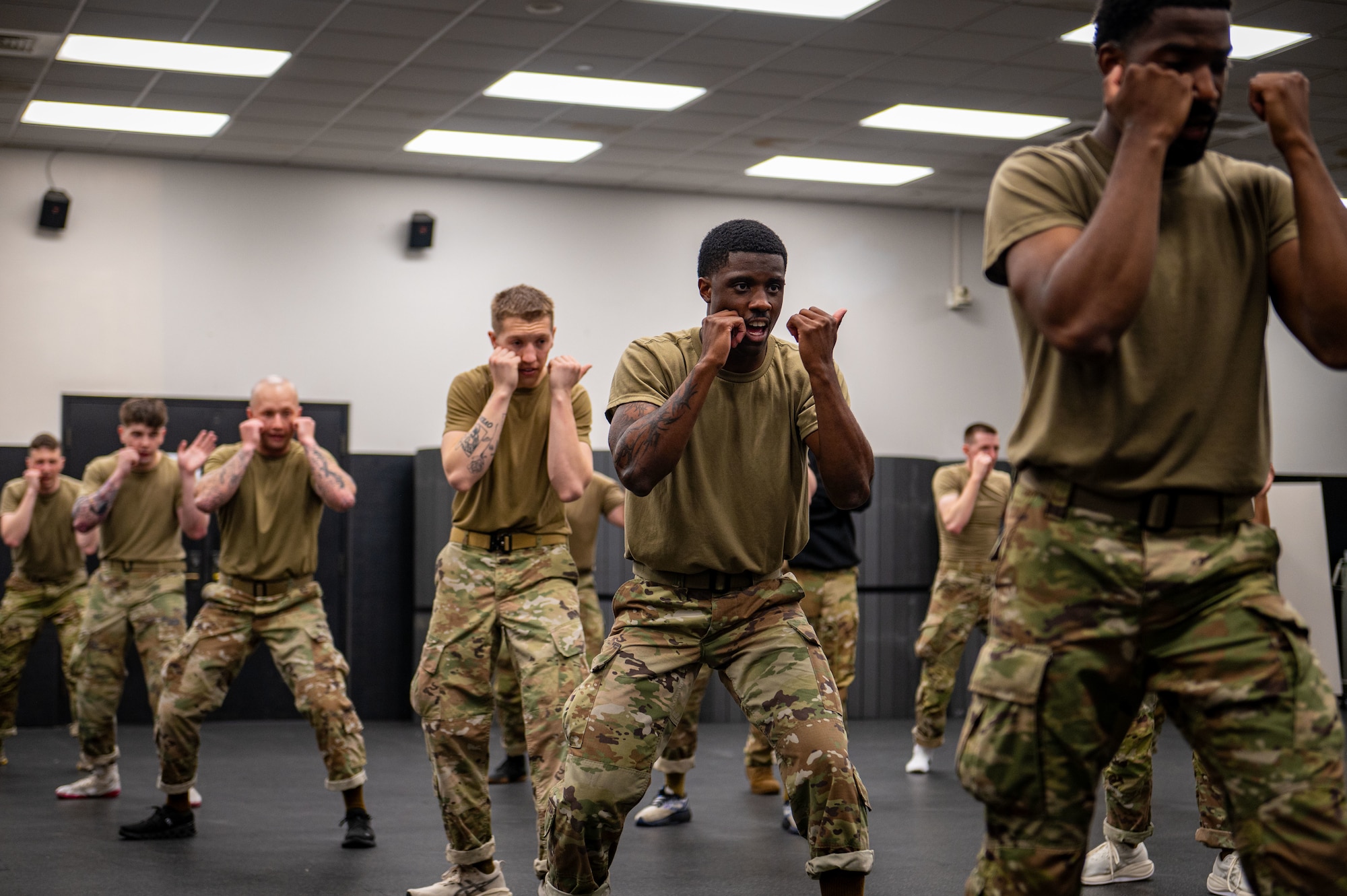 U.S. Air Force Senior Airman Daevon Larkins, 47th Security Forces, trainer, practices a defensive stance during combatives training at the Phoenix Raven Qualification Course at Joint Base McGuire-Dix-Lakehurst, N.J., April 21, 2026. The course prepares future Ravens to ensure the security of aircrew, aircraft and cargo in hostile or high-threat areas. (U.S. Air Force photo by Jewaun McElroy)
