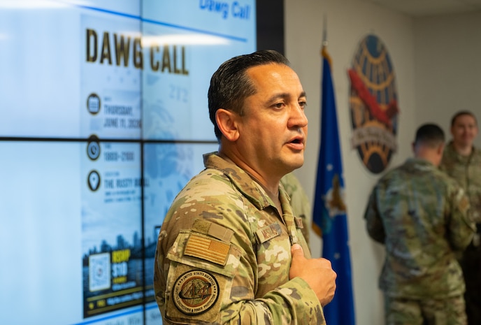A Senior Master Sgt. briefs a room of Air Transportation Specialist.