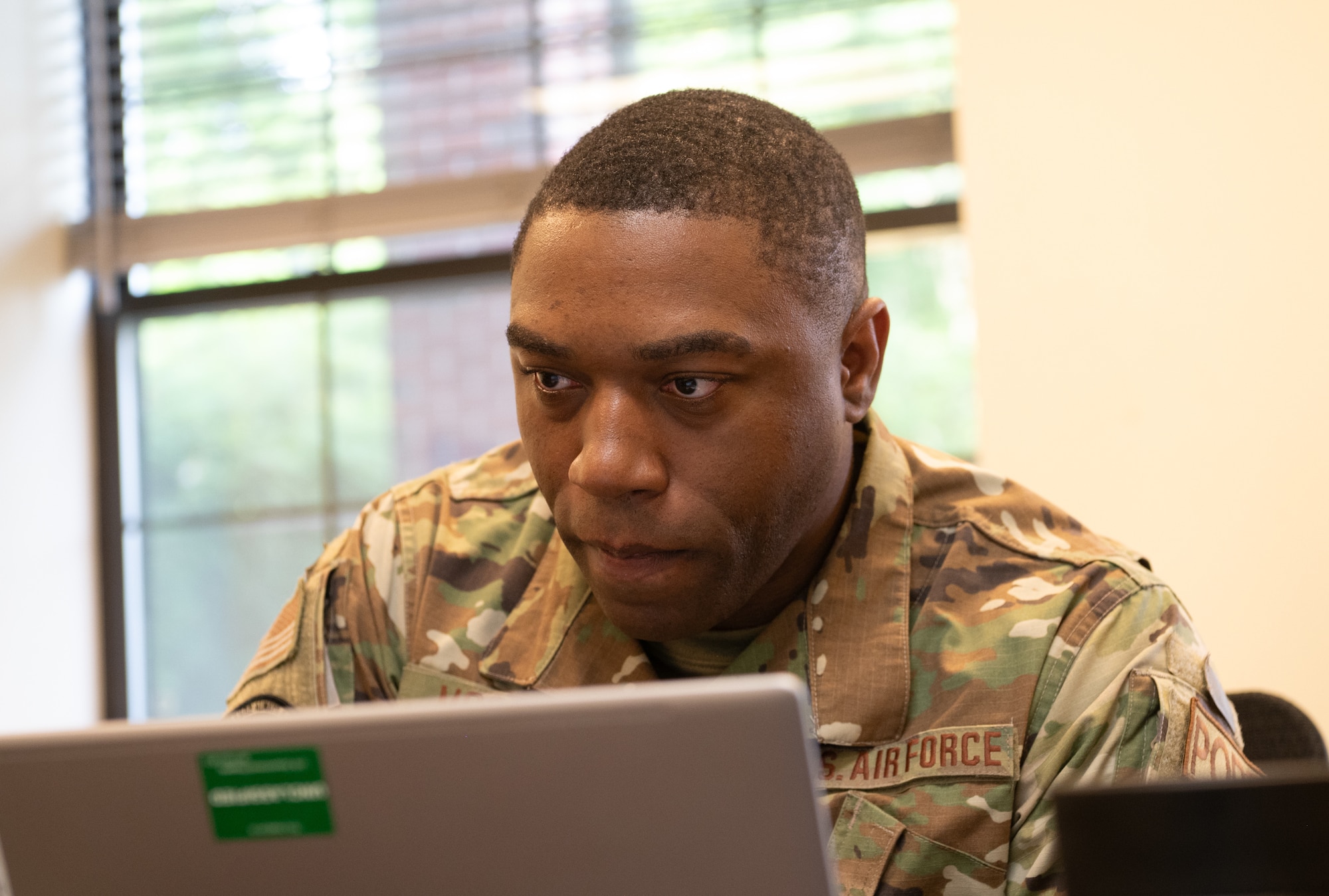 An U.S. Air Force Air Transportation Specialist works on a new training model.