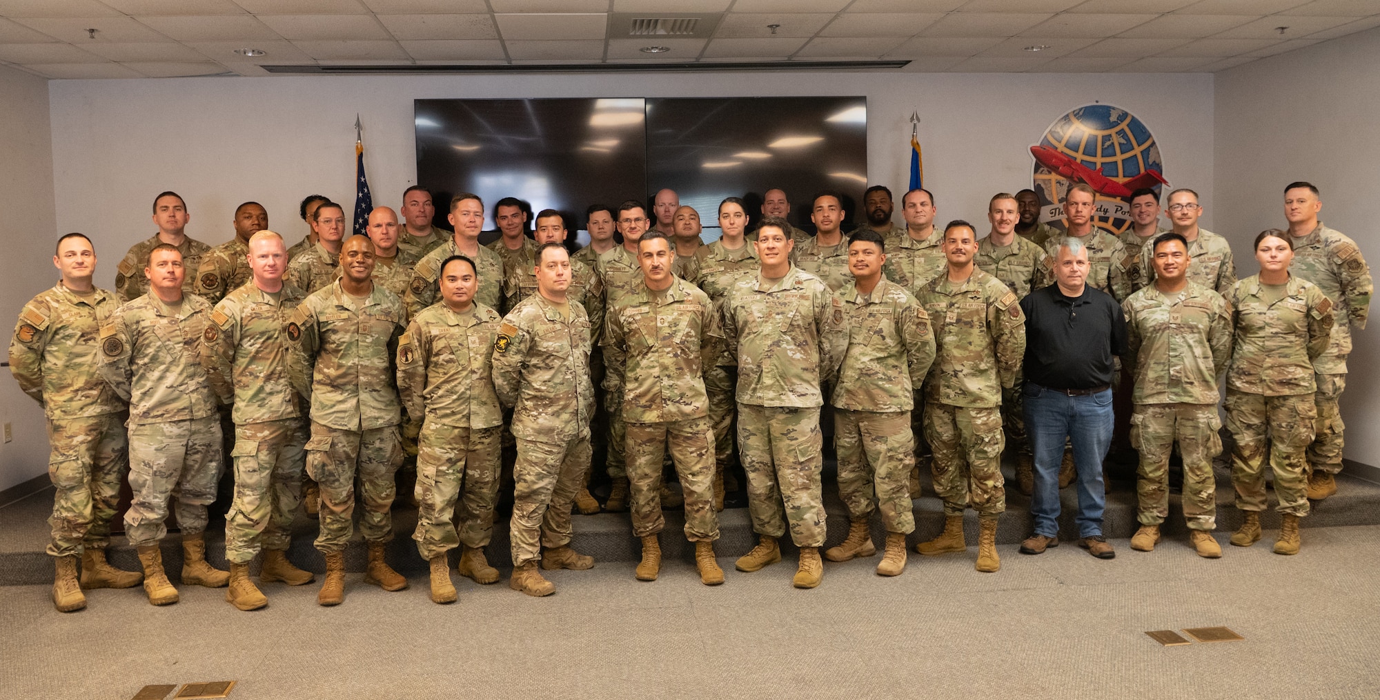 Air Transportation Specialist pose for a photo.