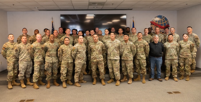 Air Transportation Specialist pose for a photo.