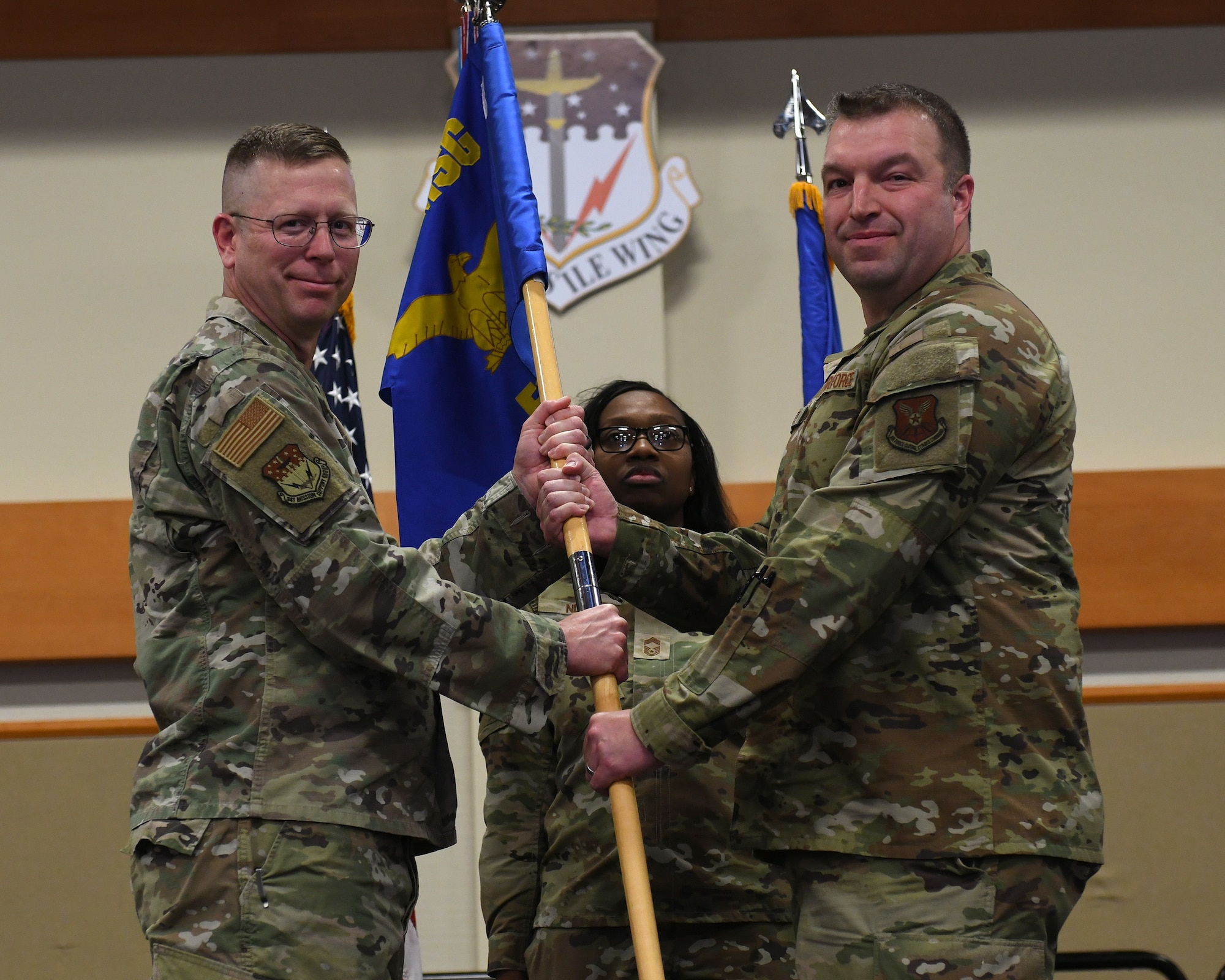U.S. Air Force Maj. David Supowit, right, accepts command of the 341st Force Support Squadron from Col. Brian Low, 341st Mission Support Group commander, during a change of command ceremony at Malmstrom Air Force Base, Montana, June 12, 2026.