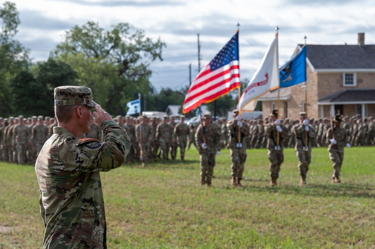 U.S. Army Lt. Col. Jonathan "Matt" Lovelace, incoming 344th Military Intelligence Battalion commander, renders a salute to the battalion formation during the change of command ceremony at the Fort Concho parade grounds, San Angelo, Texas, June 12, 2026. During his command, Lovelace will lead the Silent Sentinels and ensure Soldiers graduating from Goodfellow Air Force Base are tactically and technically competent and ready to join the Joint Team.(U.S. Air Force photo by Senior Airman James Salellas)