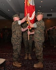 U.S. Marine Corps Brig. Gen. Kevin Collins, right, outgoing commanding general of 3rd Marine Logistics Group, relinquishes command of 3rd MLG to Brig. Gen. Christopher Haar, incoming commanding general of 3rd MLG, during a change of command ceremony on Camp Kinser, Okinawa, Japan, June 3, 2026. The ceremony marked the formal transfer of authority and responsibility, honoring Collins’ leadership and service while welcoming Haar as the incoming commanding general. Marines, Sailors, family members, and distinguished guests gathered to recognize the enduring legacy of leadership within 3rd MLG and reaffirm the unit’s commitment to supporting III Marine Expeditionary Force throughout the Indo-Pacific. (U.S. Marine Corps photo by Lance Cpl. Rachel Mason)