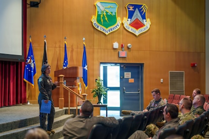 Brig. Gen. Succaro speaks to attendees during the Air Reserve Component Seminar at Air War College.