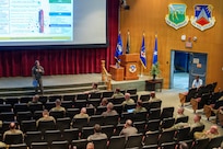 Brig. Gen. Succaro speaks to attendees during the Air Reserve Component Seminar at Air War College.