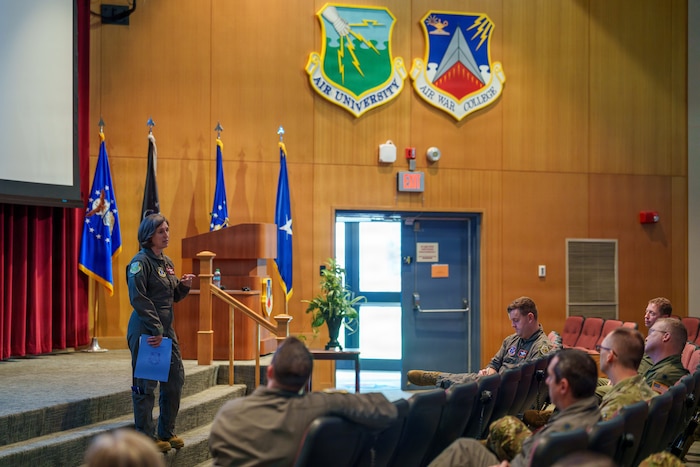Brig. Gen. Succaro speaks to attendees during the Air Reserve Component Seminar at Air War College.