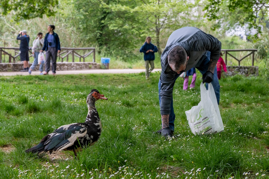 Sailors, personnel, and family members assigned to Naval Support Activity (NSA) Souda Bay participate in a community relations event cleaning Lake Agias in Chania, Greece, April 16, 2026.