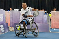 Retired U.S. Army Staff Sgt. Gene Calantoc returns a shot during a pickleball match at the Henry B. Gonzalez Convention Center in San Antonio, Texas, June 13, 2026.