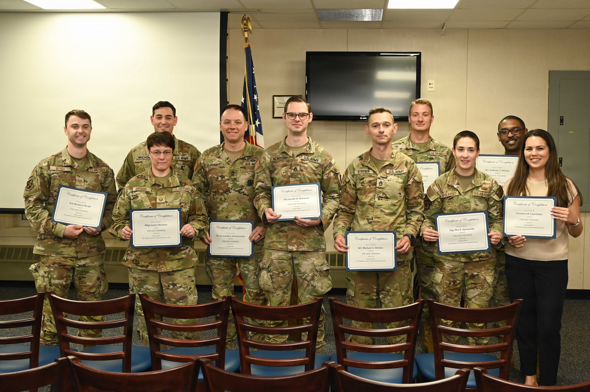 Pennsylvania Air National Guard and Pennsylvania National Guard members pose after completing CPR and automated external defibrillator (AED) certification during a TAG Safety Stand Down at Biddle Air National Guard Base, Pa., May 28, 2026. The training reinforced life-saving emergency response skills and readiness across multiple mission sets within the 111th Attack Wing. (U.S. Air National Guard photo by Senior Airman Matthew Bergh)