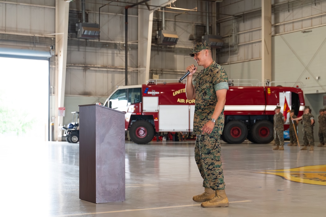 U.S. Marine Corps Lt. Col. David Rubio, Marine Corps Detachment Goodfellow commanding officer, addresses the crowd during a change of command ceremony at the Louis F. Garland Department of War Fire Academy, Goodfellow Air Force Base, Texas, June 12, 2026. The mission of MCD Goodfellow is to provide administrative, logistical and comprehensive training support to staff and students in the occupational fields of signals intelligence and expeditionary firefighting and rescue in order to deliver technically proficient, combat-capable Marines to the operating force and supporting establishment. (U.S. Air Force photo by Senior Airman Brian Lummus)