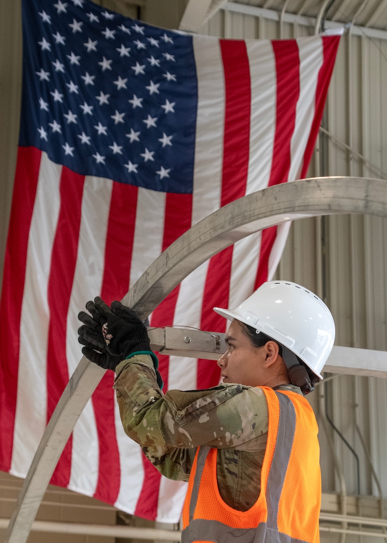 Army Sgt. Alondra Lopez, assigned to DLA Disposition Services Unit 2, in Anniston, Alabama, assembles an Alaska Small Shelter as part of the Joint Contingency Operational Readiness Training held in Battle Creek, Michigan.
