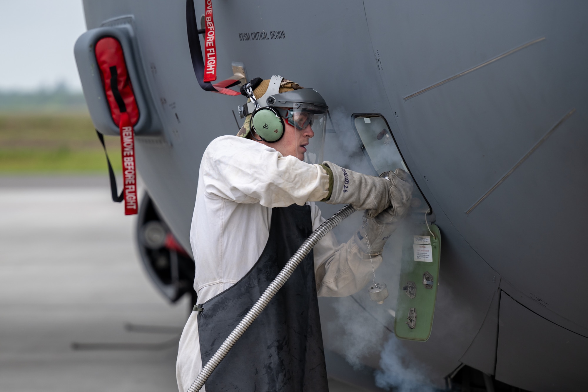 U.S. Air Force Senior Airman Joseph Mitchell, a crew chief assigned to the 123rd Airlift Wing, Kentucky Air National Guard, loads liquid oxygen into a C-130J Super Hercules aircraft at Karup Air Base, Denmark, June 8, 2026. The 123rd AW is providing tactical airlift support to NATO Allies throughout the month of June in support of Ramstein Flag 2026, an Allied Air Command large-scale, multi-location and joint operating area exercise with 18 participating nations and more than 200 aircraft. (U.S. Air National Guard photo by Lt. Col. Dale Greer)